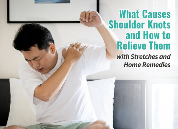 A man holding his shoulder in pain