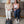 Mom_and_girl_use_foot_massager_when_sit_on_sofa